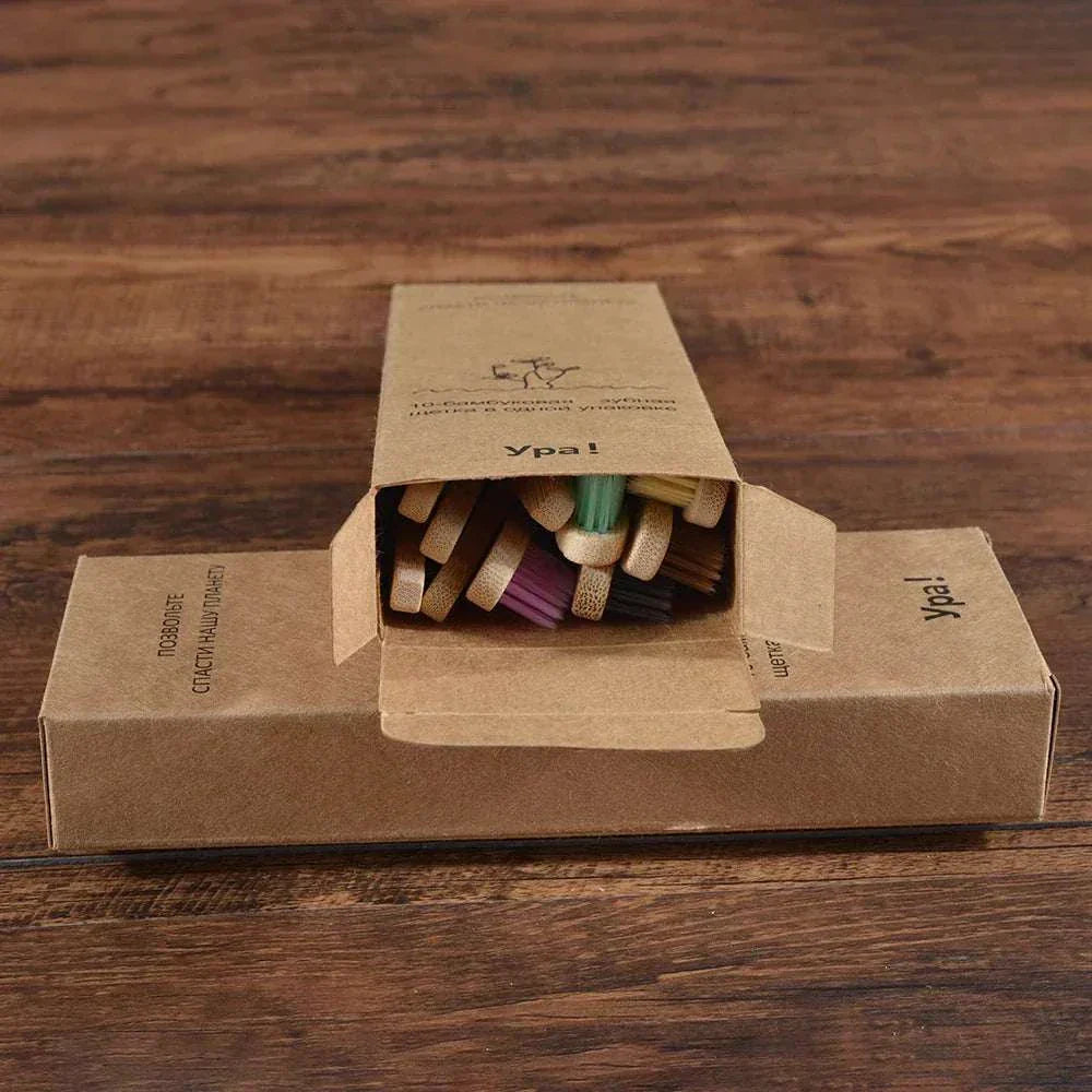 10-piece set of eco-friendly bamboo toothbrushes with natural handles and black bristles