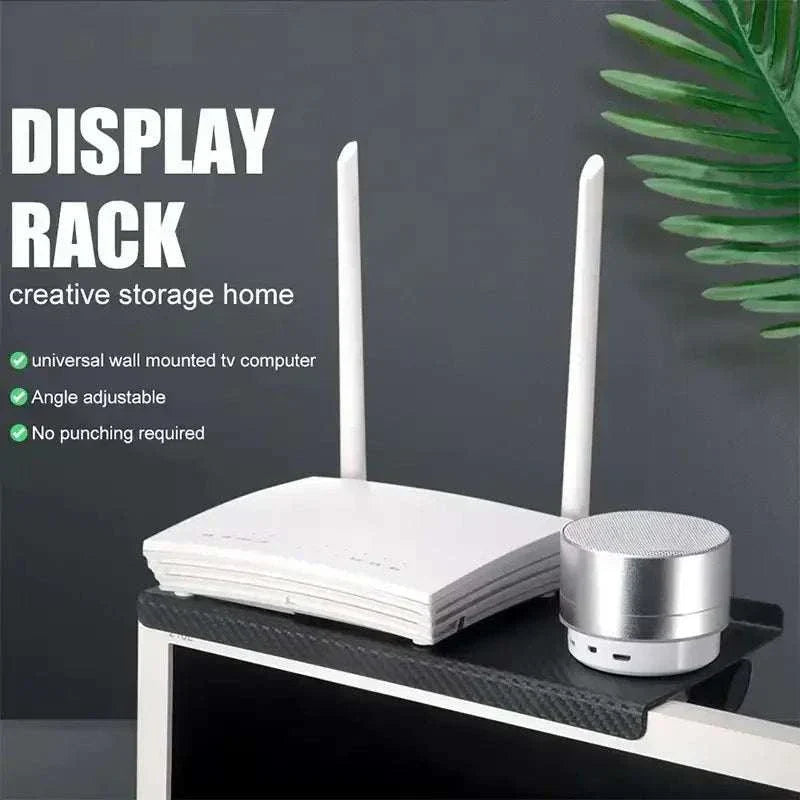 Sleek computer and TV screen storage rack organizing wireless routers and set-top boxes in black and white options