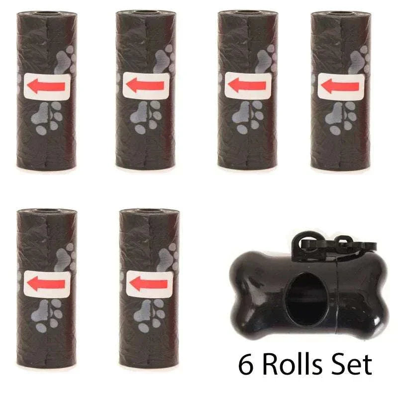 Six rolls of black pet poop bags with paw prints and a bone-shaped dispenser with leash clip