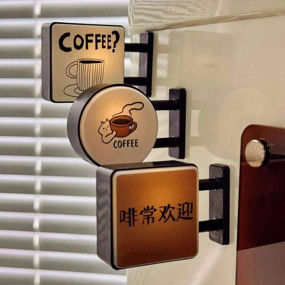 Mini lightbox fridge magnet with coffee and Japanese design glowing softly on metallic surface