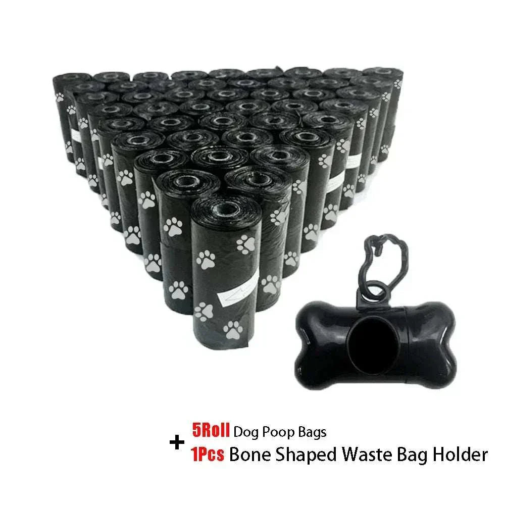 Black biodegradable pet poop bags rolls with bone-shaped dispenser and leash clip for dog waste disposal