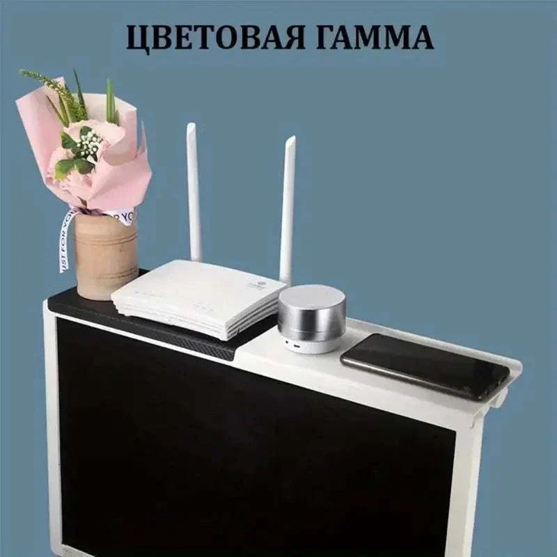 Computer and TV screen storage rack organizing wireless routers and set-top boxes in black and white colors