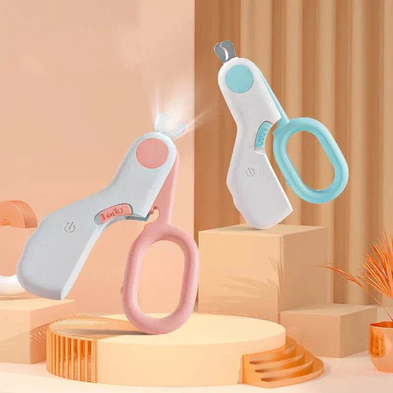 LED light pet nail clipper with safety lock and stainless steel blades for precise grooming of cats and dogs