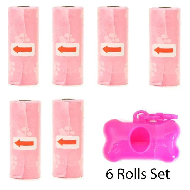 Set of 6 pink pet poop bags rolls with bone-shaped dispenser and leash clip for dog waste cleanup