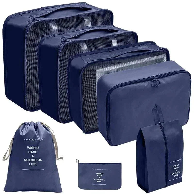Set of portable travel organizer storage bags in various sizes for luggage packing