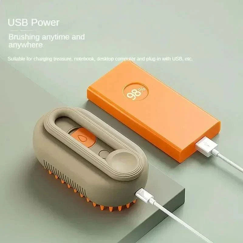 Electric pet grooming brush with steam spray, deshedding, and massage for dogs and cats