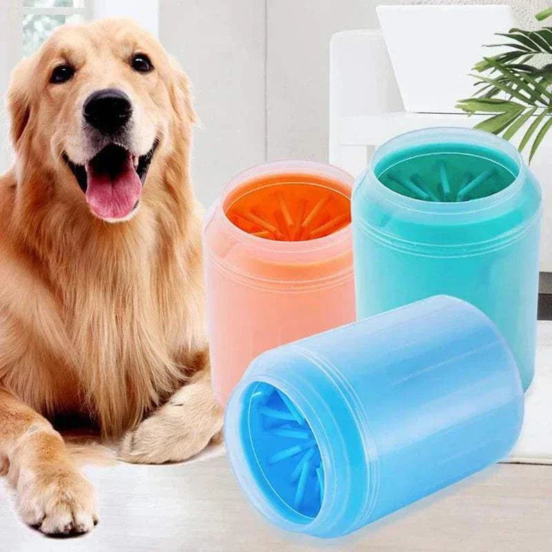 Portable pet paw cleaner silicone foot cleaning brush in blue, orange, and green colors with a happy golden retriever dog nearby