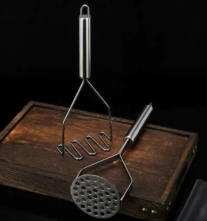 Stainless steel potato masher with ergonomic grip and rounded head for gentle cookware use Stainless Steel Potato Masher