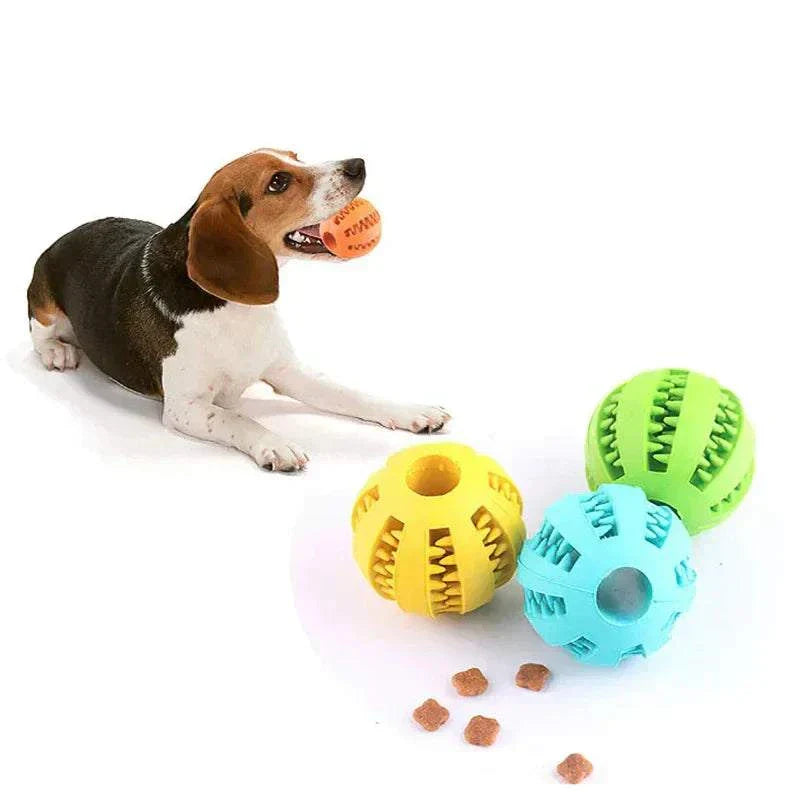 Durable rubber dog toy ball for teeth cleaning and treat feeding