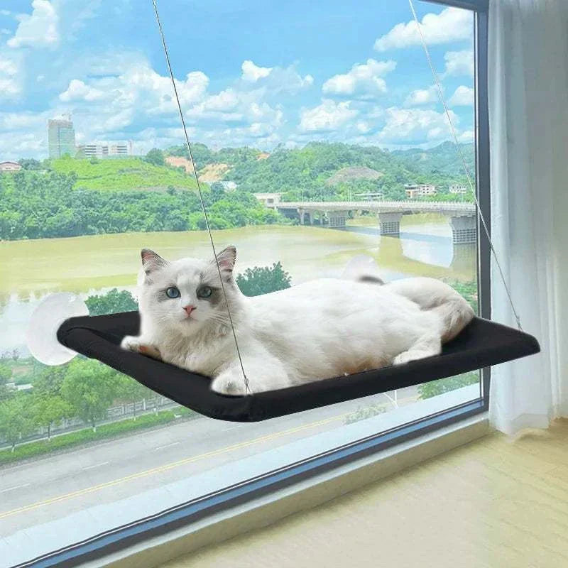 Space-saving ultra-soft cat window hammock bed with strong suction cups and breathable fabric, perfect for cozy feline naps.