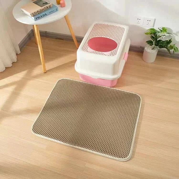 Double layer waterproof cat litter mat with honeycomb surface and non-slip backing for trapping litter and protecting floors.