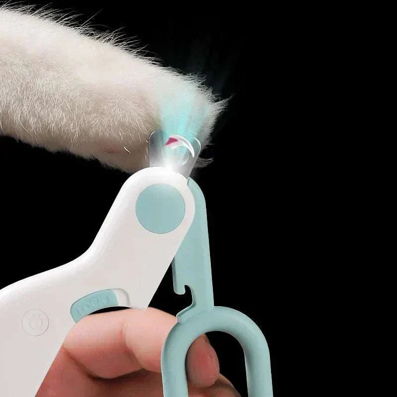 LED light pet nail clipper with safety lock and stainless steel blades for precise grooming