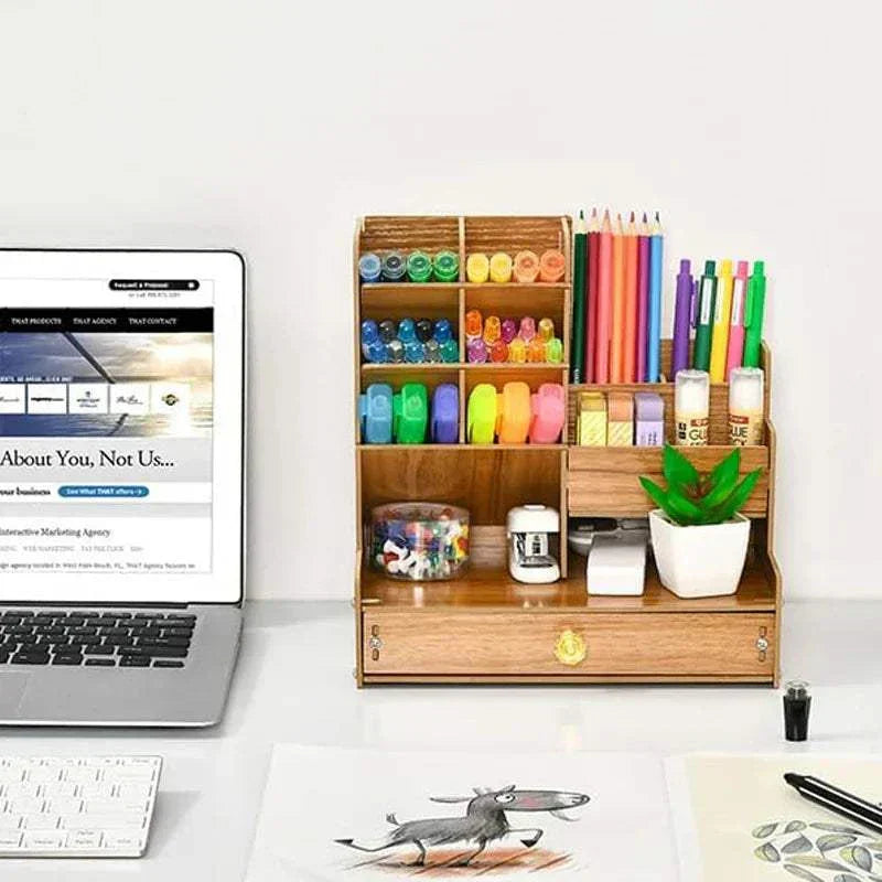 Wooden desk organiser with multiple compartments and drawer for pens and stationery