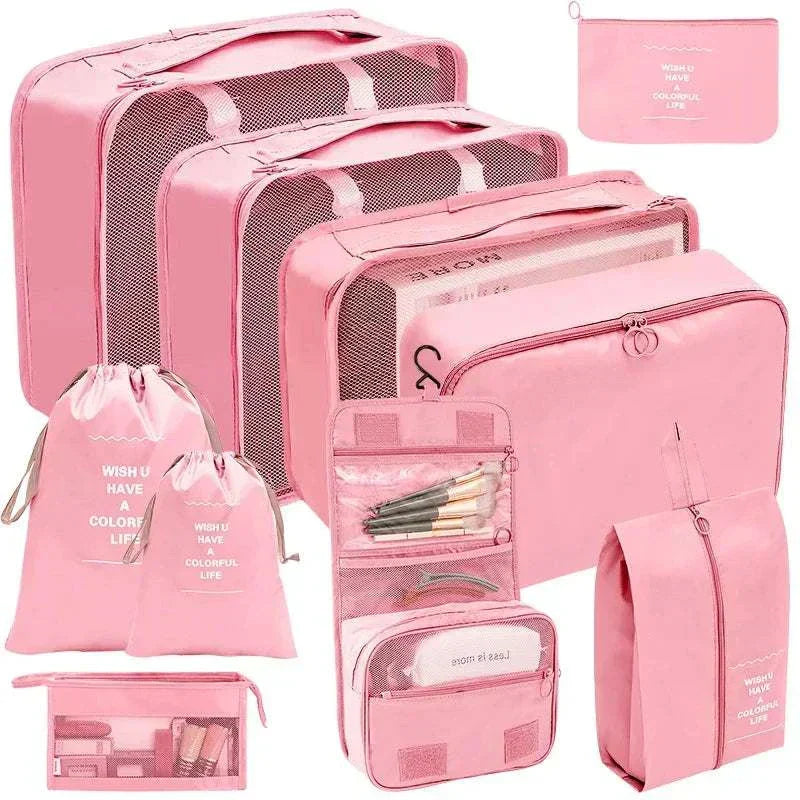 Set of portable travel organizer storage bags in various sizes for luggage packing and organization