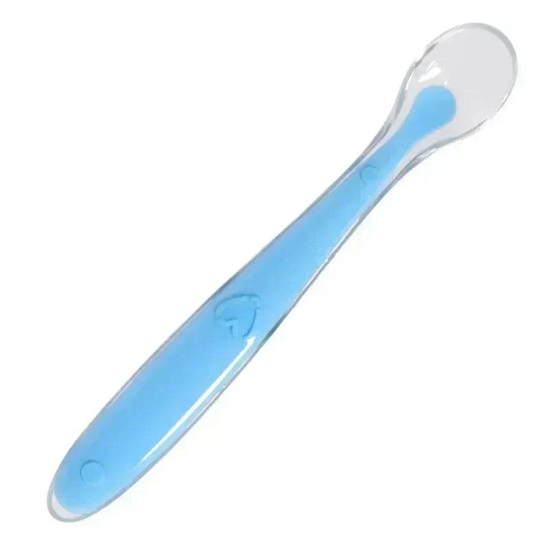 Blue silicone spoon for baby feeding, soft and BPA-free infant feeder utensil