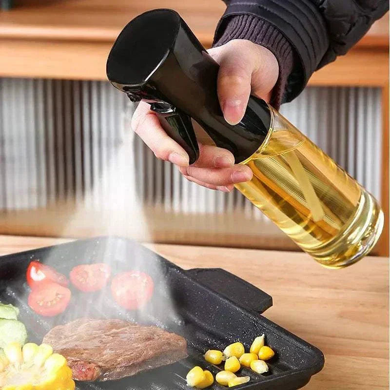 Transparent oil spray bottle with colored cap for cooking and baking