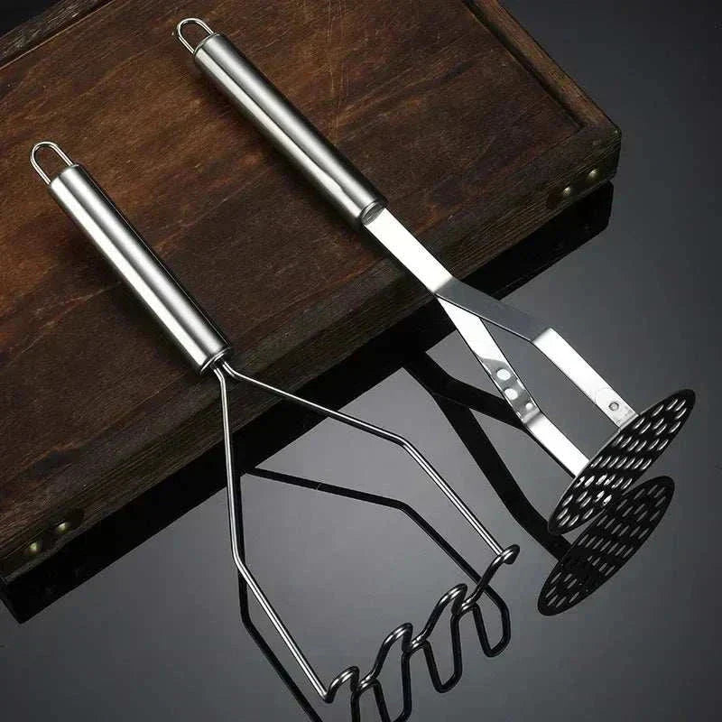 Stainless steel potato masher with ergonomic non-slip grip and rounded wire head for gentle, efficient mashing and easy cleaning. Stainless Steel Potato Masher