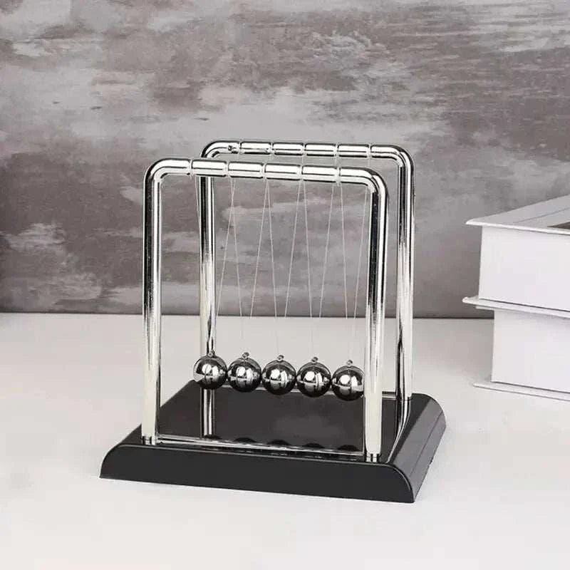 Newton's Cradle desktop toy with steel balls and black plastic base for physics demonstration and stress relief Newton's Cradle