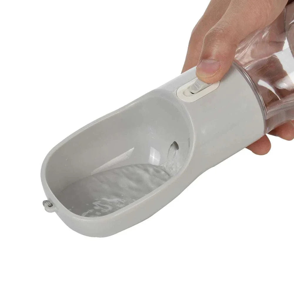 Leakproof portable dog water bottle with built-in drinking bowl for small and large dogs and cats, gray color.