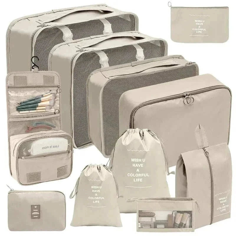 Set of portable travel organizer storage bags in various sizes for luggage organization