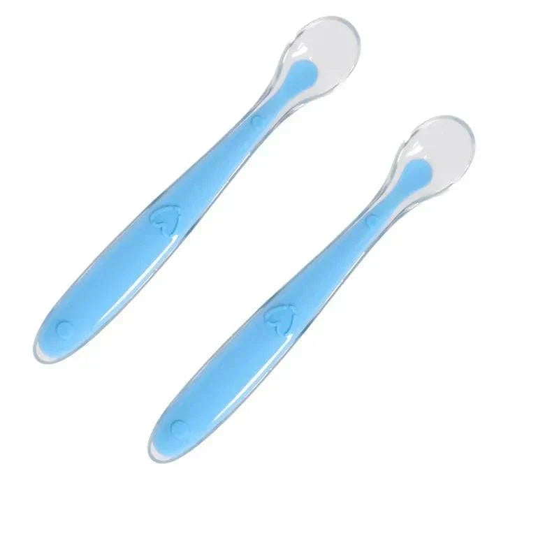 Blue silicone baby feeding spoons for infants with soft and safe BPA-free material