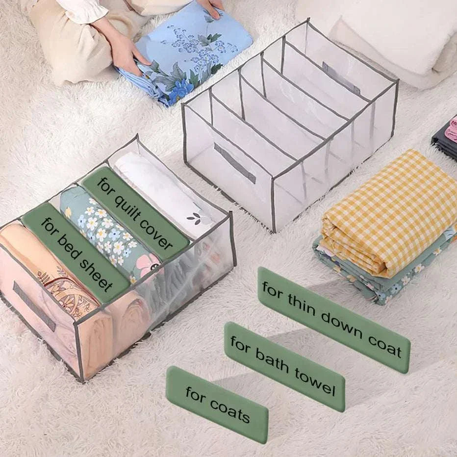 Large capacity quilt cover storage organizer with 5 mesh compartments for bed sheets, down jackets, towels, and coats in gray and white.