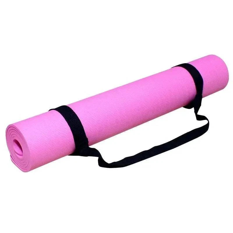 Adjustable black yoga mat carry belt strap holding rolled pink yoga mat for easy transport