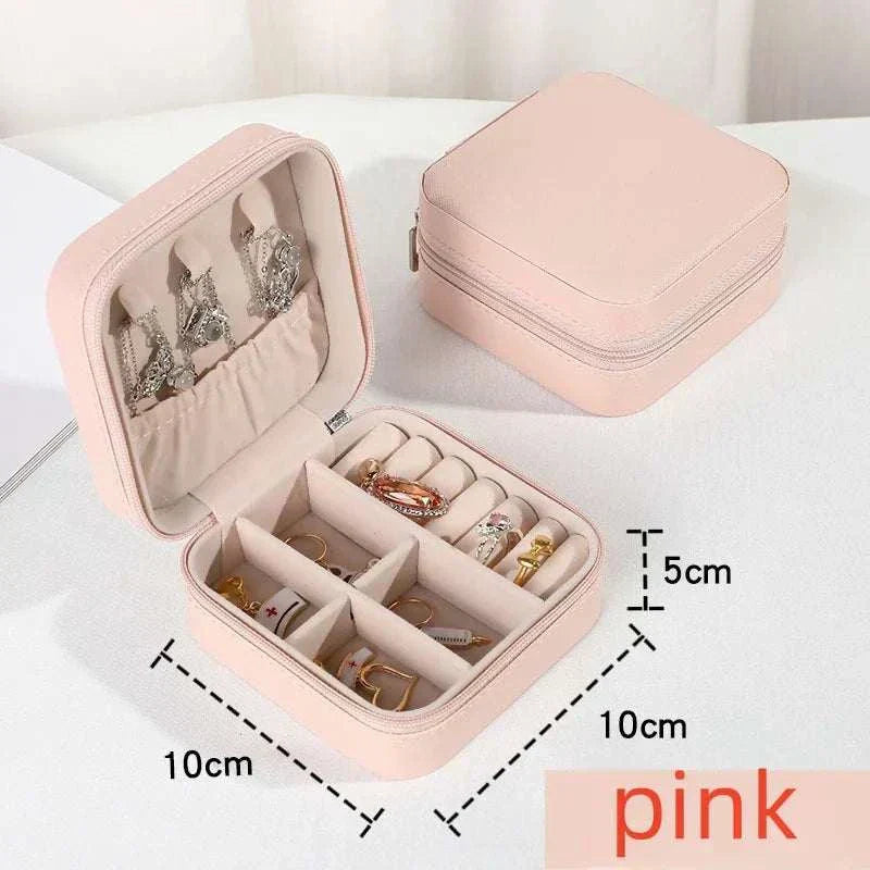 Pink mini jewelry box with compartments for earrings, rings, and necklaces, portable PU leather travel organizer