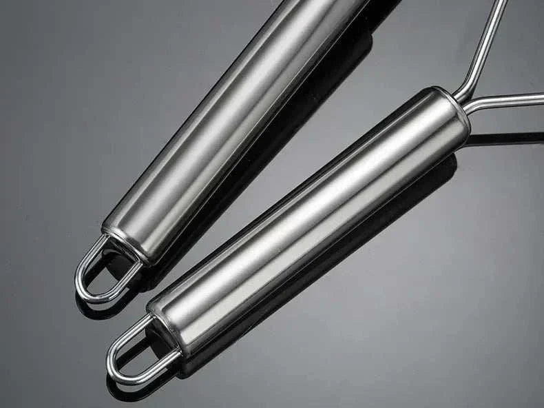 Stainless steel potato masher with ergonomic handle and rounded wire head for smooth mashing Stainless Steel Potato Masher