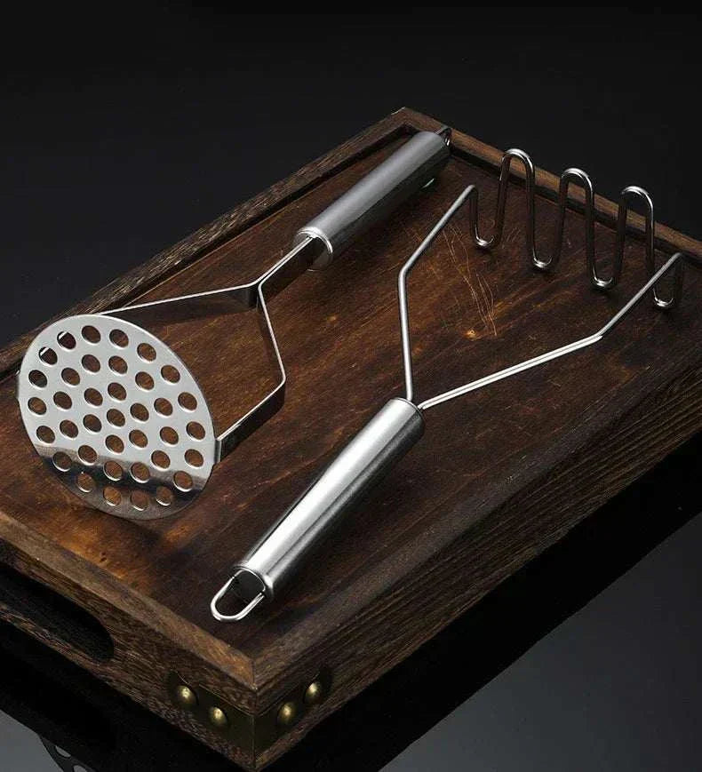 Stainless steel potato masher with ergonomic handle and rounded wire head for smooth mashing and cookware protection Stainless Steel Potato Masher