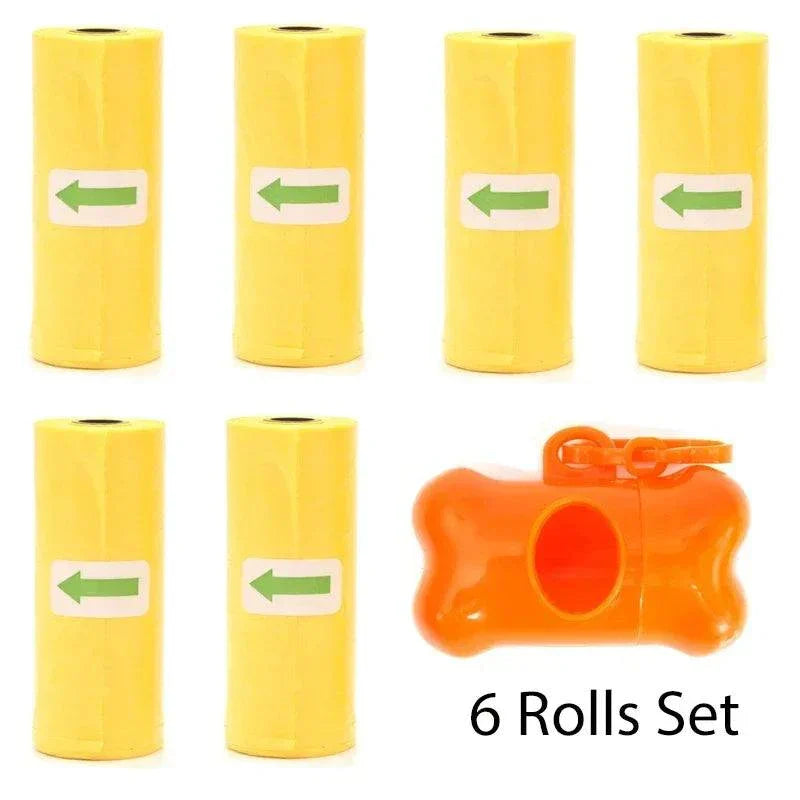 Yellow pet poop bag rolls with orange bone-shaped dispenser and leash clip set of six