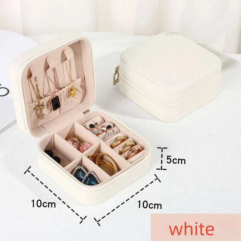 white mini jewelry box with compartments for rings, earrings, and necklaces, portable PU leather travel organizer