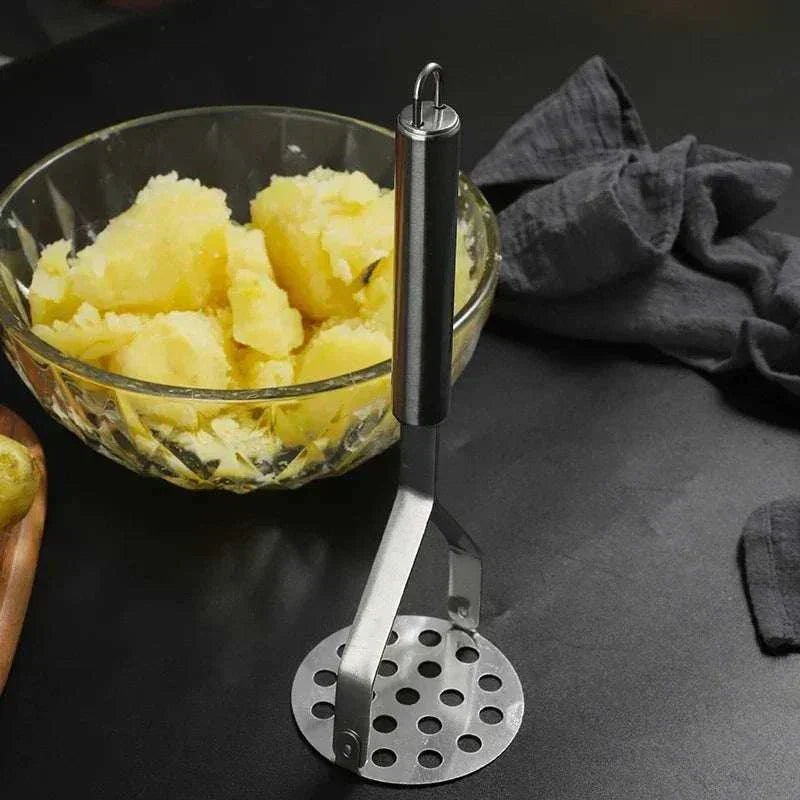 Stainless steel potato masher with ergonomic non-slip handle and rounded wire head for gentle, efficient mashing and easy cleaning Stainless Steel Potato Masher