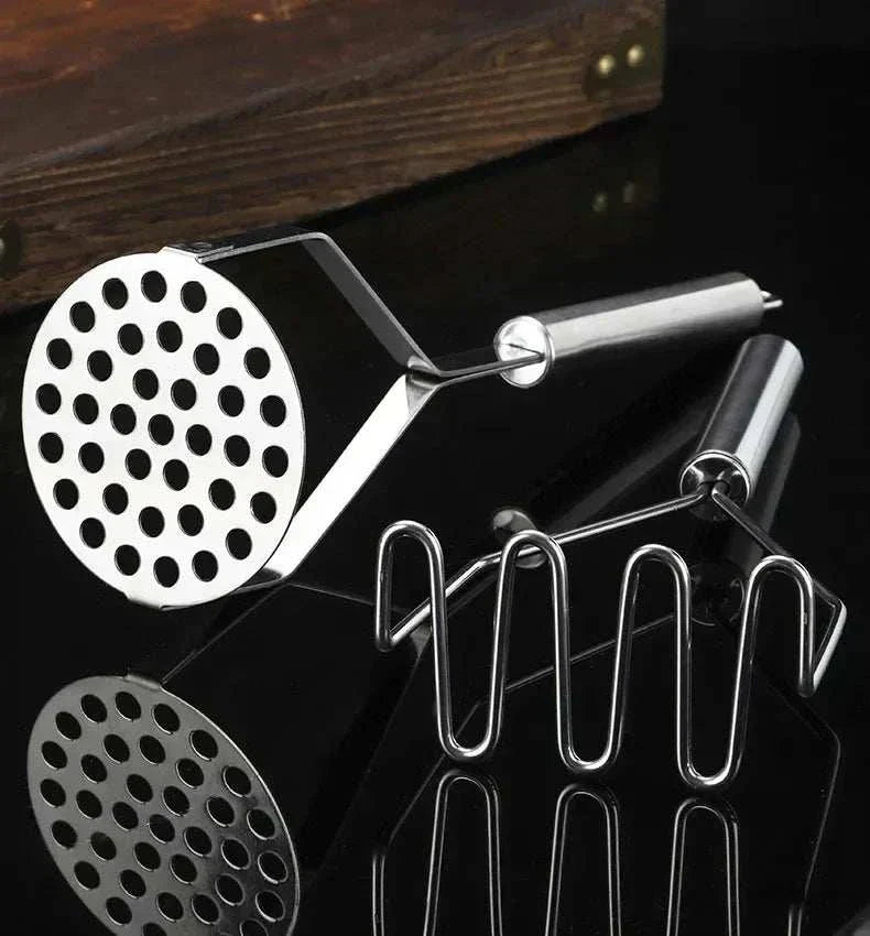 Stainless steel potato masher with ergonomic grip and rounded wire head for smooth mashing without scratching cookware Stainless Steel Potato Masher