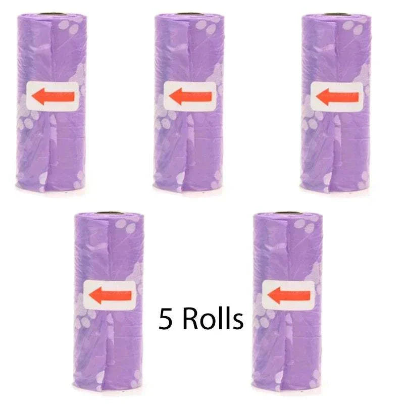 Five rolls of biodegradable purple pet poop bags with paw prints for dog waste cleanup