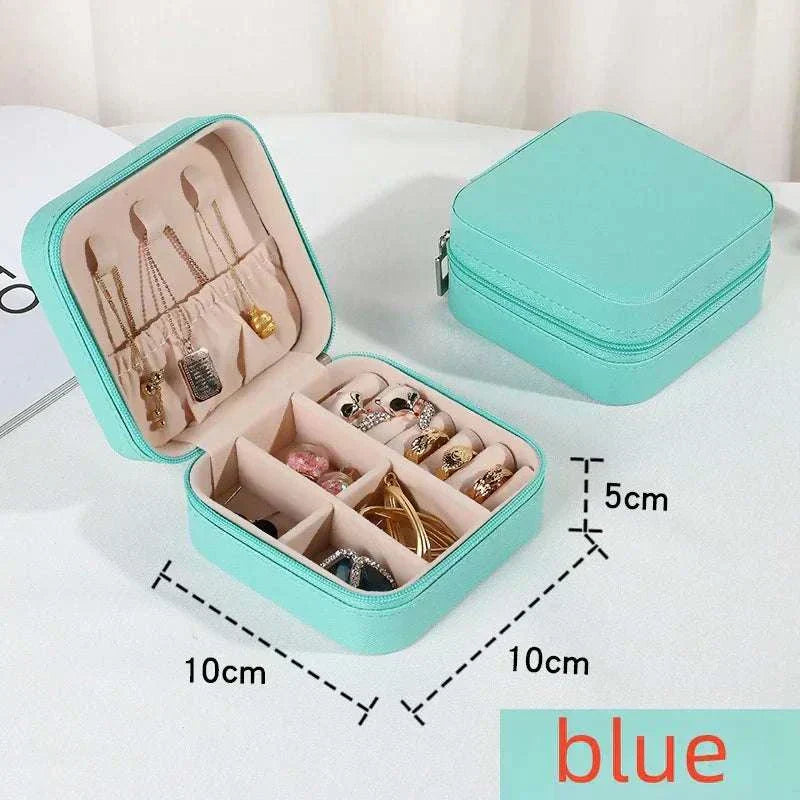 Blue mini jewelry storage box with compartments for rings and necklaces, portable PU leather travel organizer 10x10x5 cm