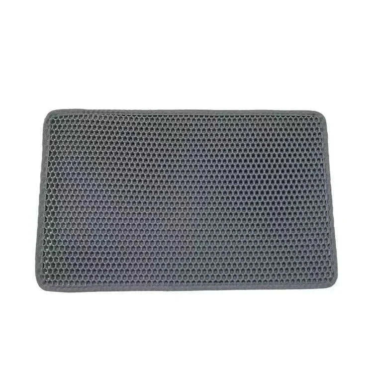Double layer waterproof cat litter mat with honeycomb surface and anti-slip base.