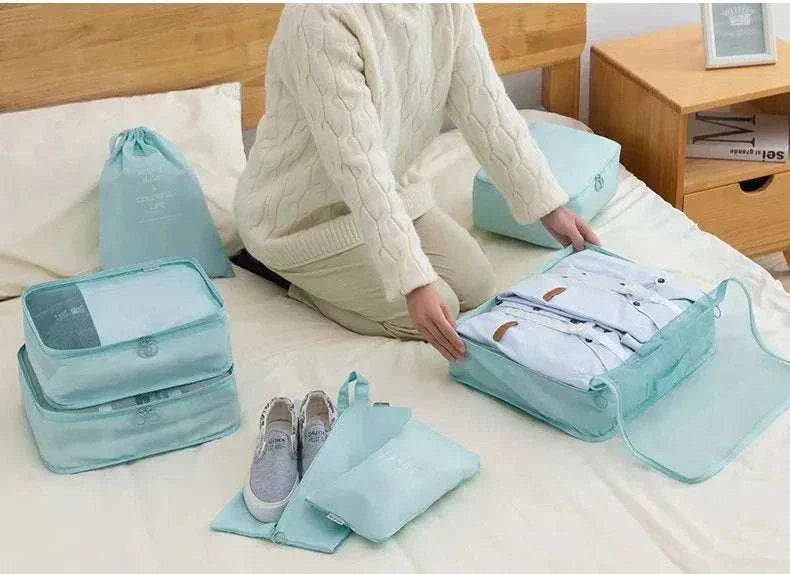 Set of lightweight, durable travel organizer storage bags for clothes and accessories in various sizes